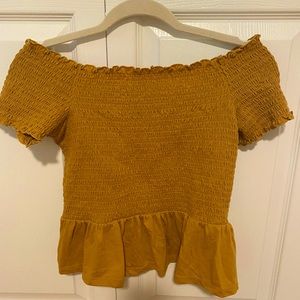 American Eagle yellow smocked shirt in a size medium.